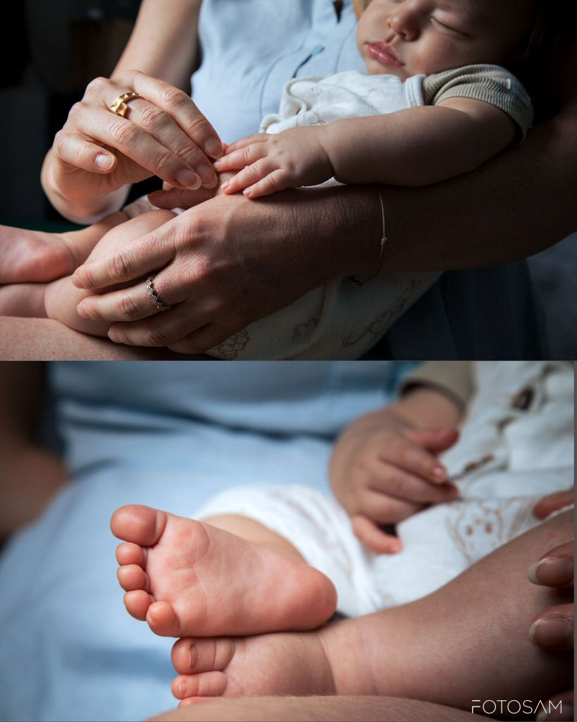 dettaglio-delle-mani-e-dei-piedini-di-un-neonato-durante-un-servizio-fotografico